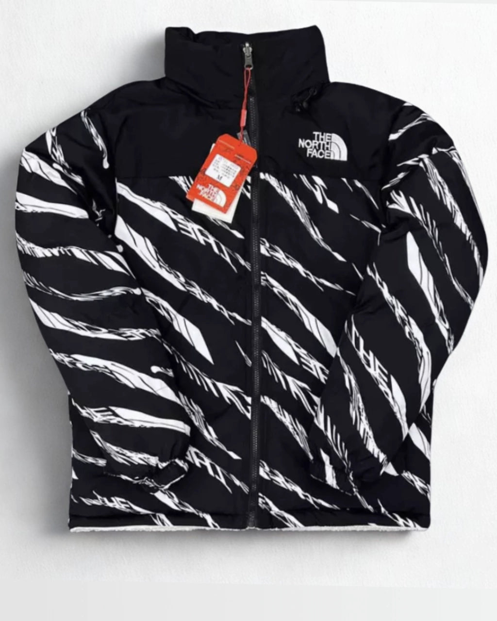 Campera TNF Nuptse REVERSIBLE SHERPA (importada)